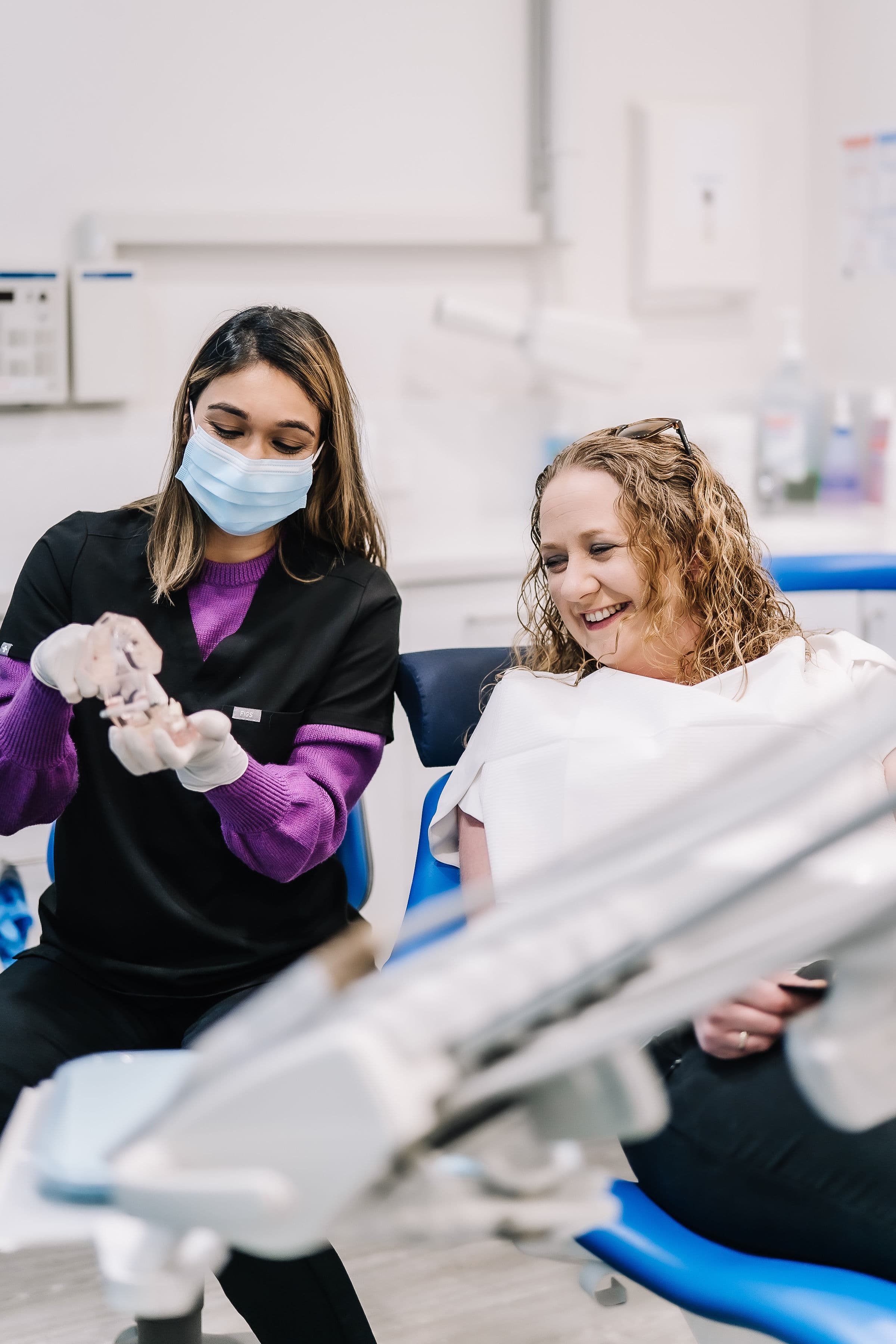 Dentist and patient reviewing a personalised dental treatment plan at Sienna Smiles