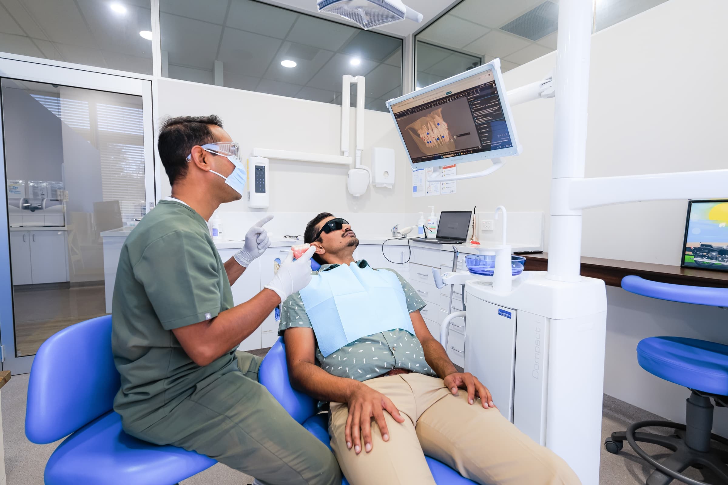 Clear Invisalign aligner tray being fitted by Dr Singh at Sienna Smiles, Hilbert